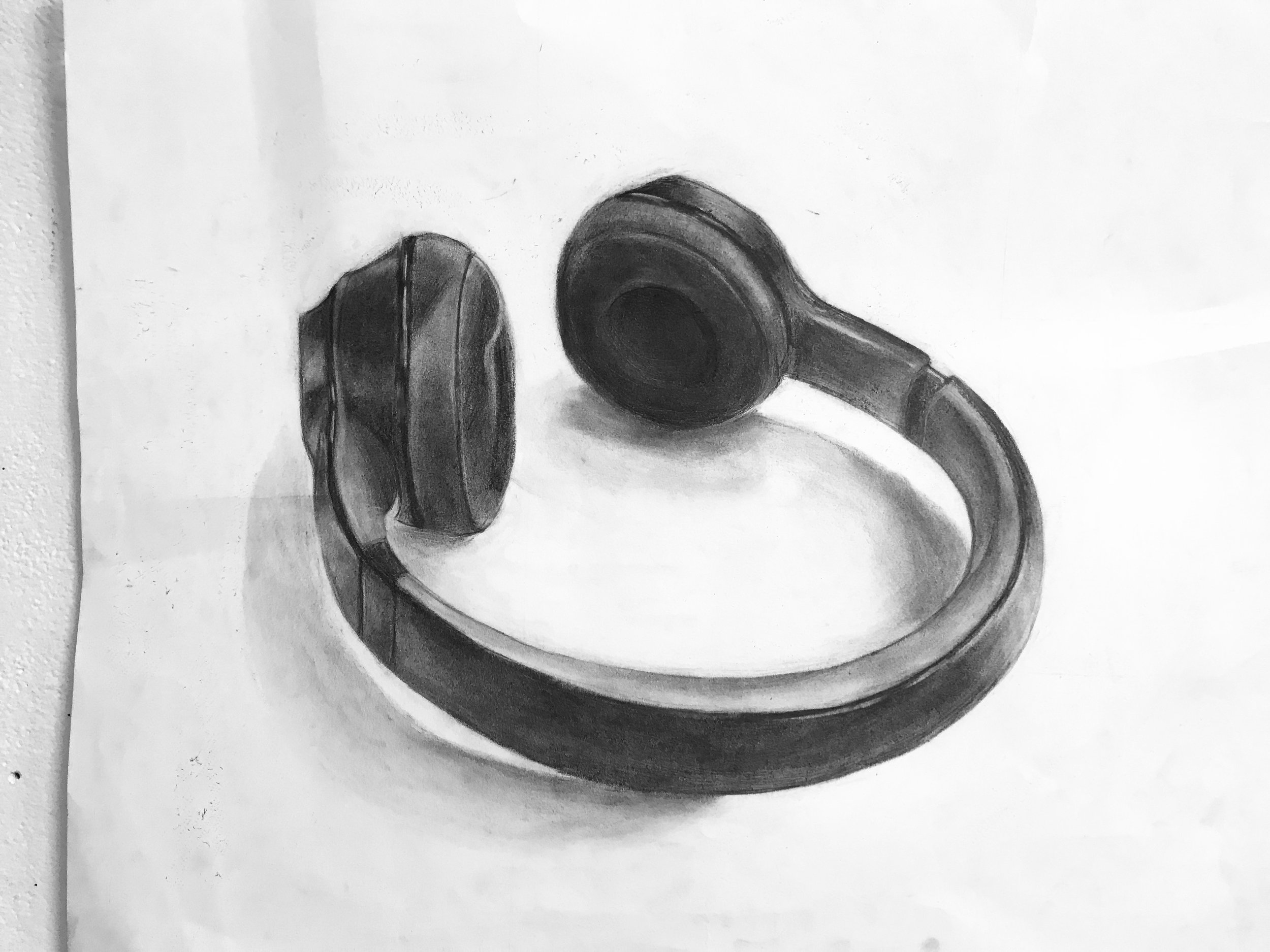 headpohne study in charcoal