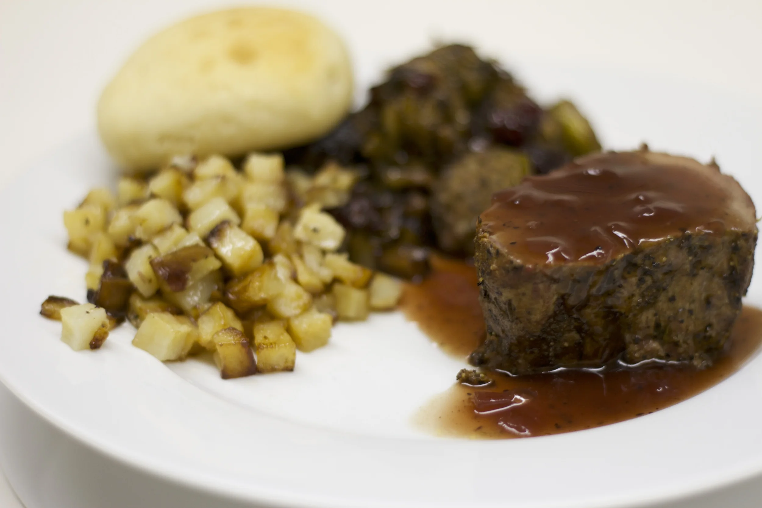 Roasted Beef Tenderloin with Port Wine Reduction, Rissole Potatoes, Roasted Brussels Sprouts
