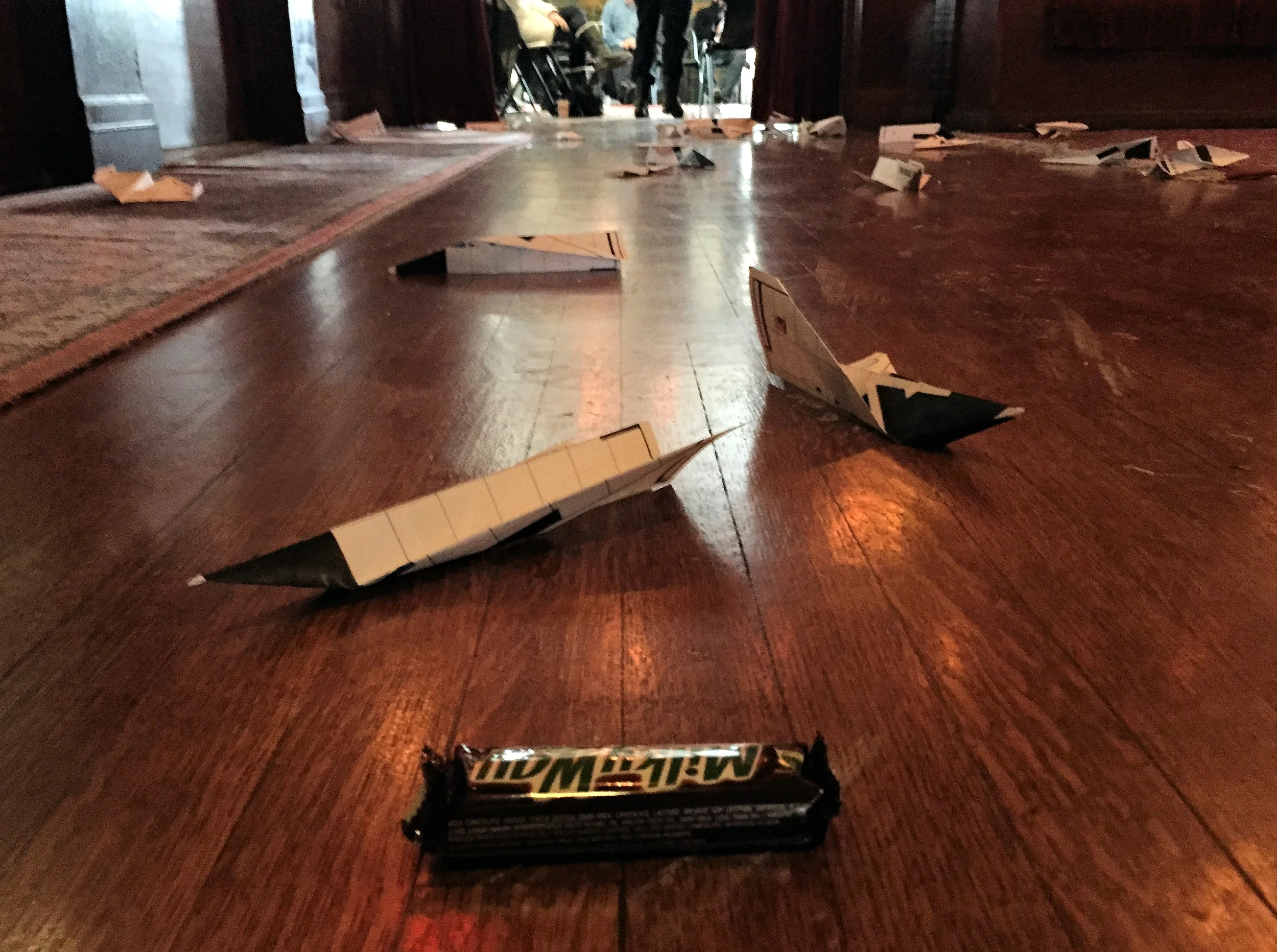 Staff "launched" their ideas and closest to the Milky Way bar won a prize. The good news is that our staff had a ton of great ideas to get us started. The bad news is that our staff is severally lacking in paper airplane making skills. 