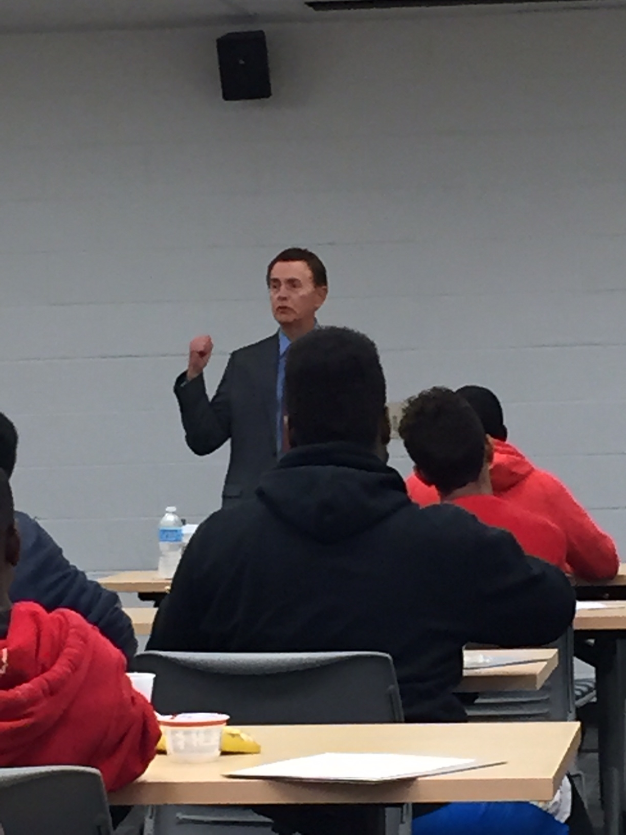 Dr. Robert Labaczewski speaking to the young men about health.