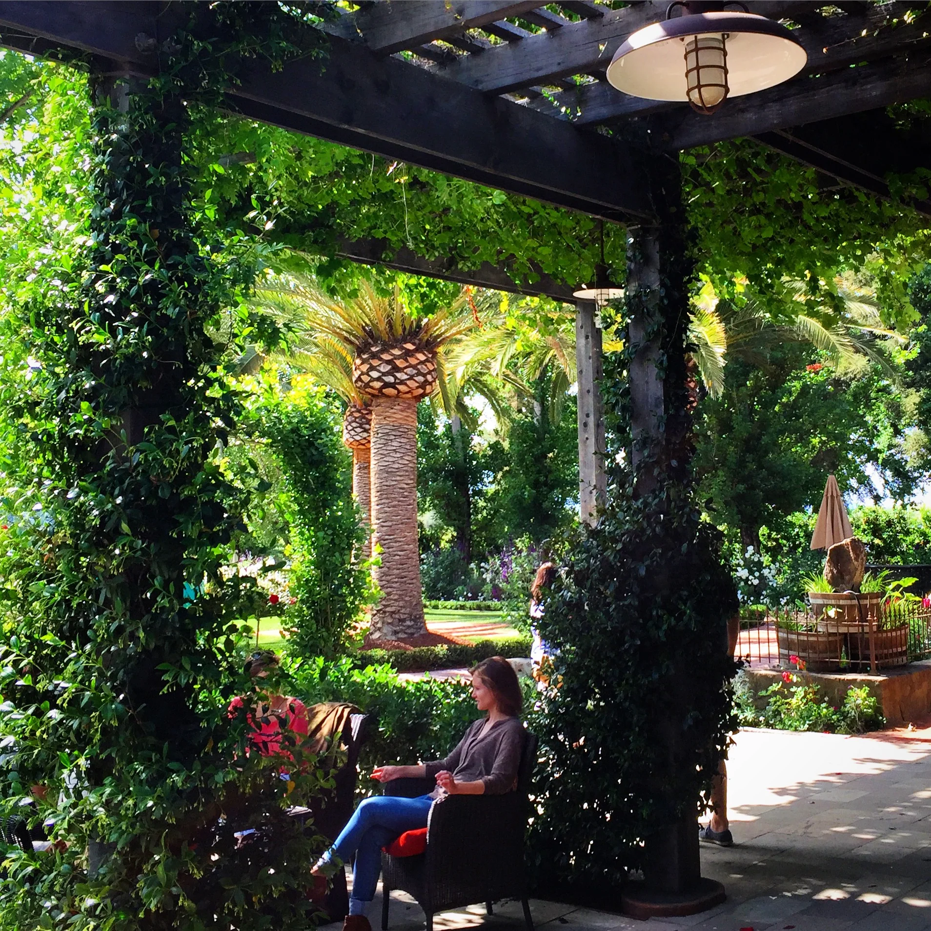 I think I should be sitting there where she is and sipping my wine instead of taking pictures.