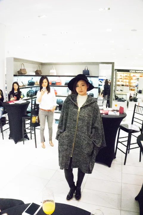 Borrowing from the boyfriend is hot right now, with an emphasis on mens tailoring and oversized layering. This Smythe tweed jacket is a fantastic example of this trend. Ivory lace shell by Alexander McQueen, leather leggings by Rag & Bone, hat by Eric Janits, stacked heel by Celine.
