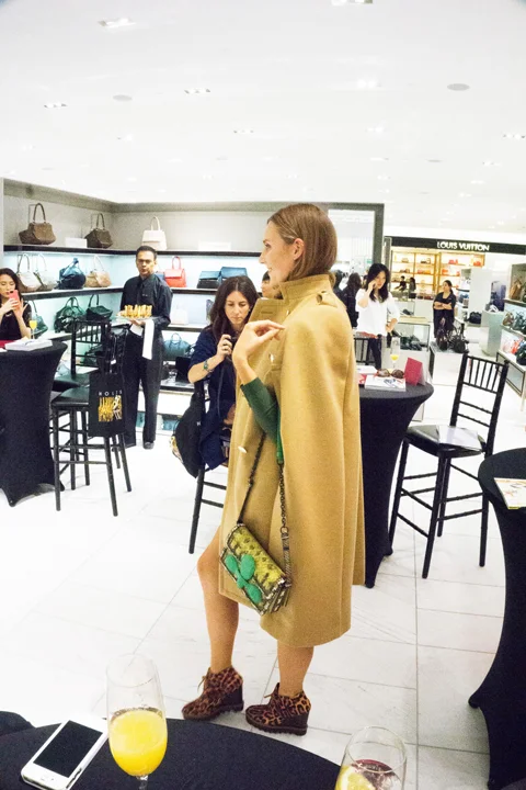 Everyone knows about the camel coat - what about a cape? It's classy and fun. I'm game. Cape by Sacai, Shoes by Stella McCartney, Bag by Bottega Venetta.