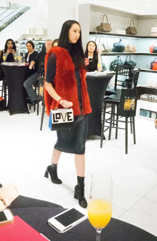 This Fendi fur vest can be worn with a pair of distressed J-brand jeans or even liquid leggings. Investment pieces need to be worn - on any occasion! Dress by Marco Di Vincenzo, shoes by Stella McCartney, Bag by Les Petit Jouers.