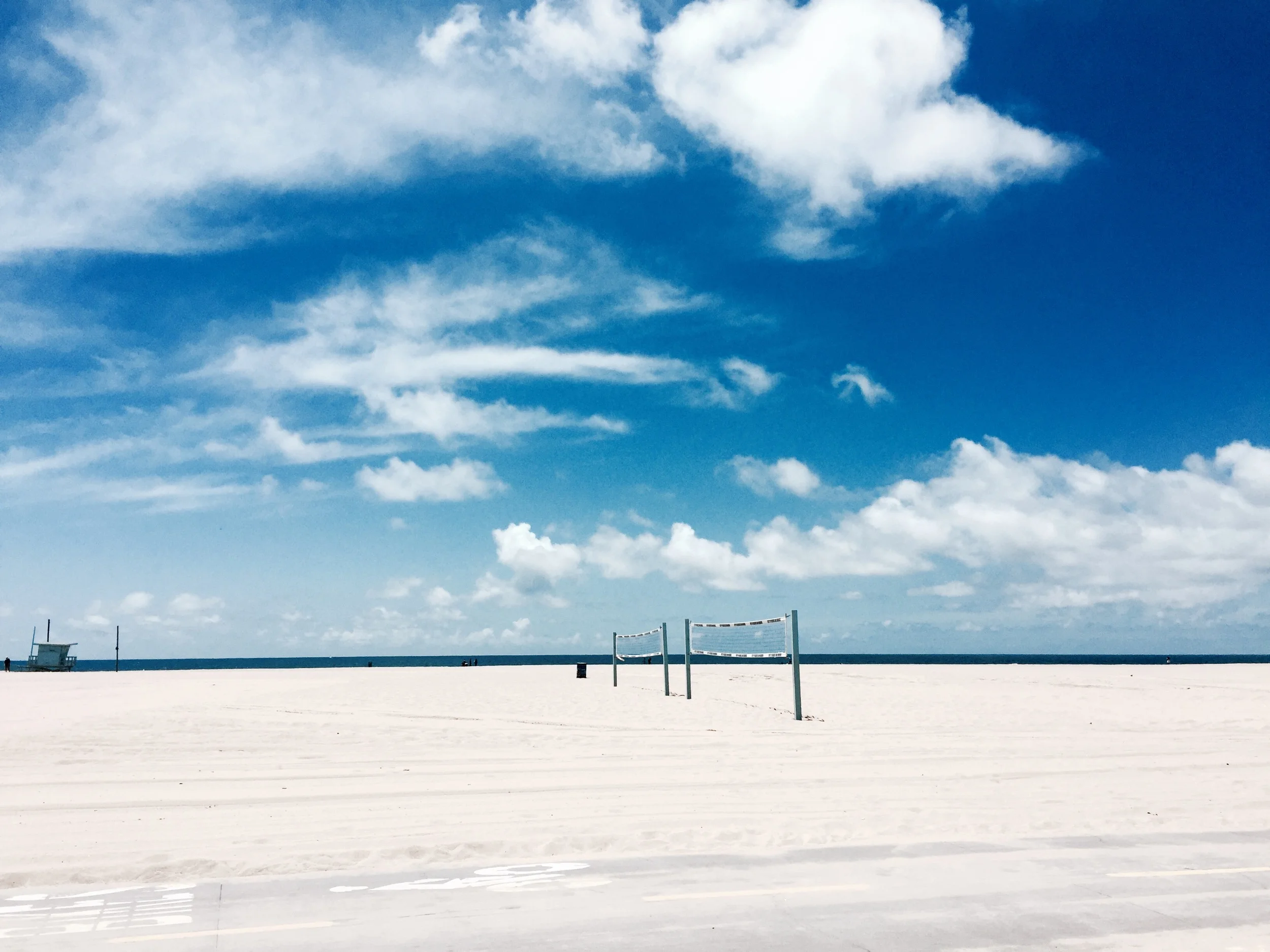 An empty Venice beach, just waiting for volleyball players.