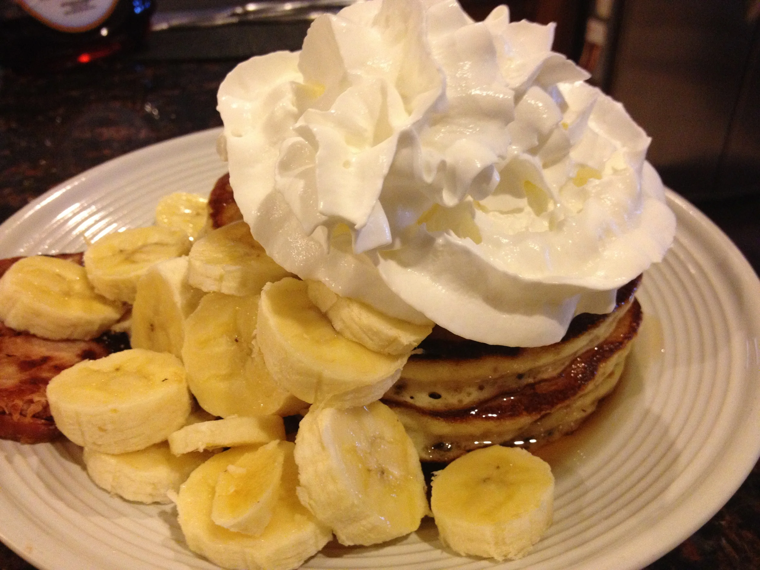 Pancakes Topped with Fruit and Cream