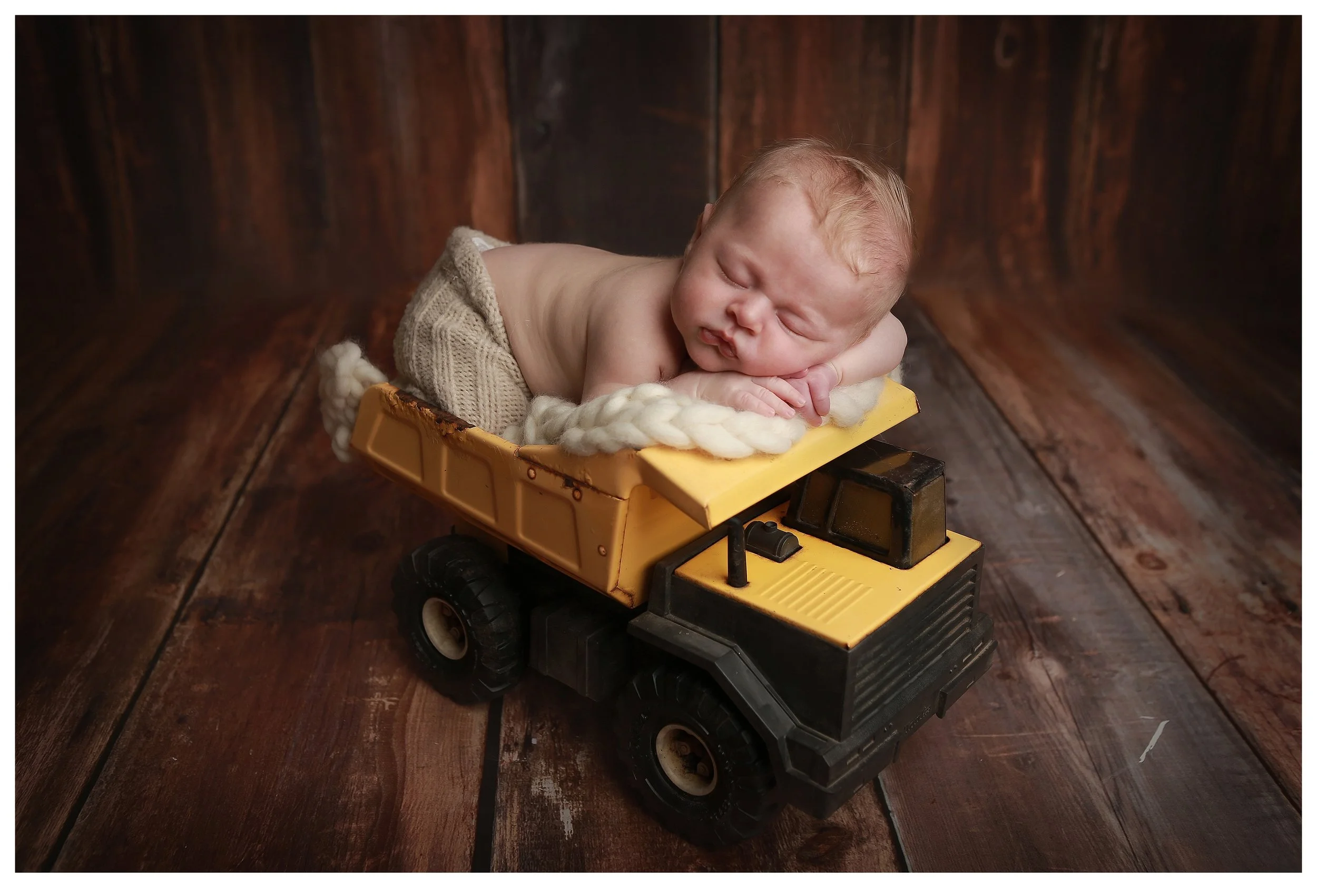 For the all around little boy pose i have a dump truck to place baby in. 