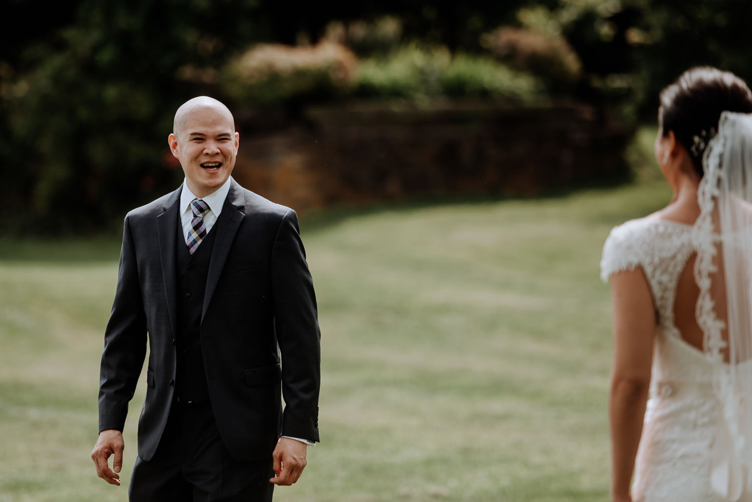 grooms reaction during first look at Red Maple Vineyard Wedding