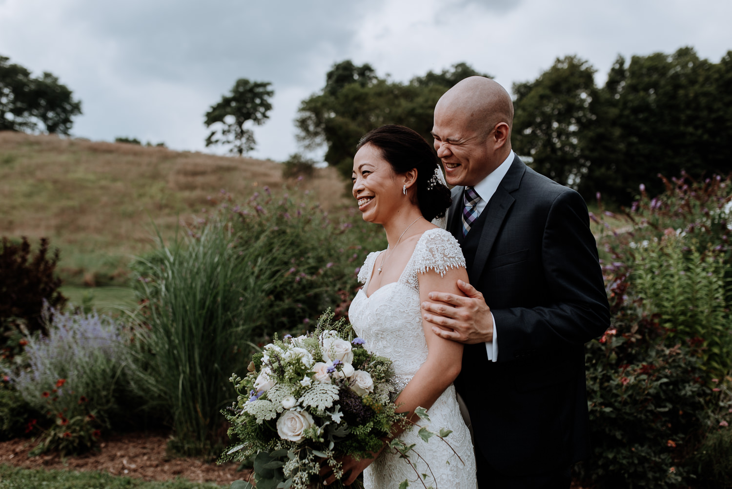 Red Maple Vineyard Wedding Photos, bride and groom candid
