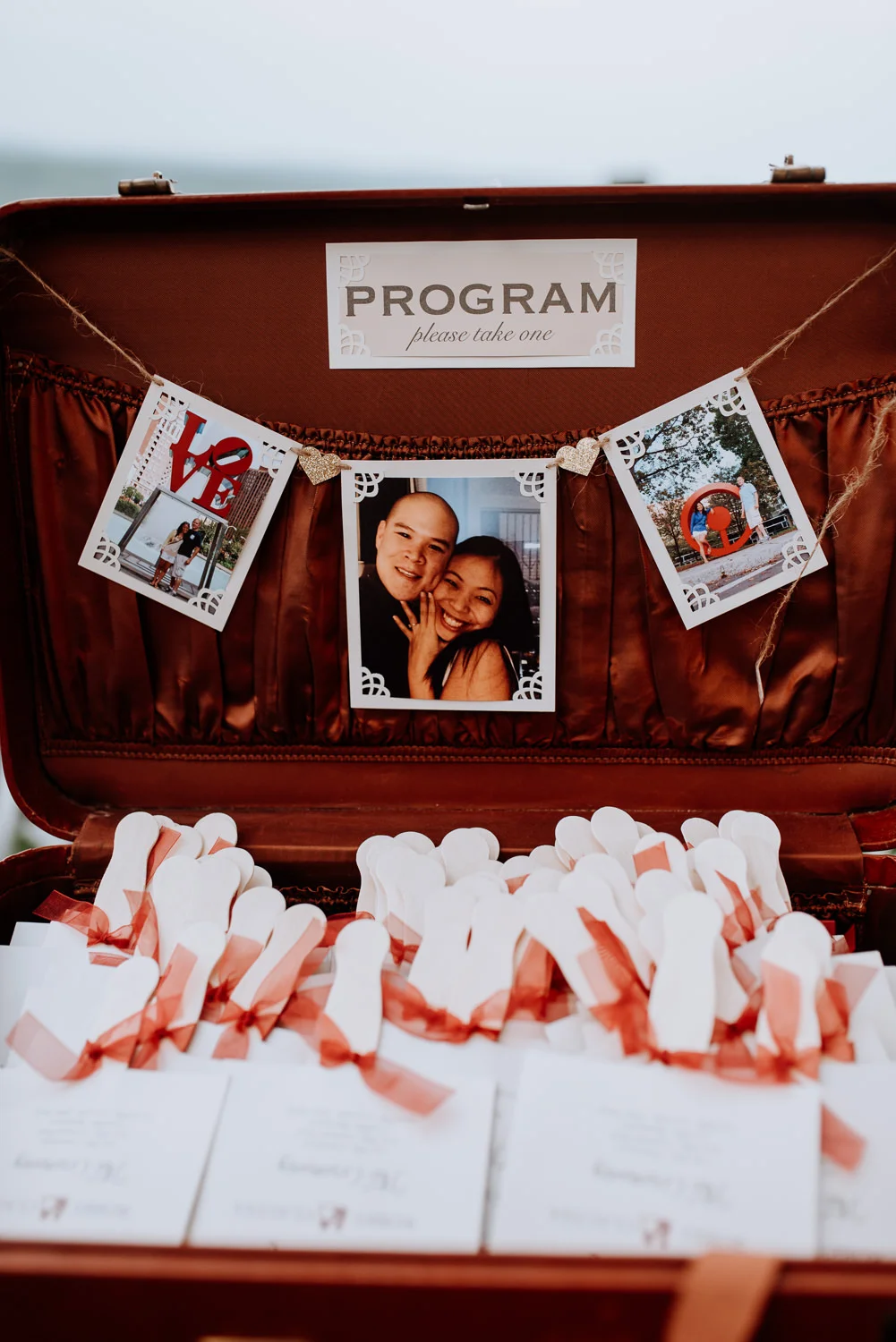 vintage suitcase for wedding programs