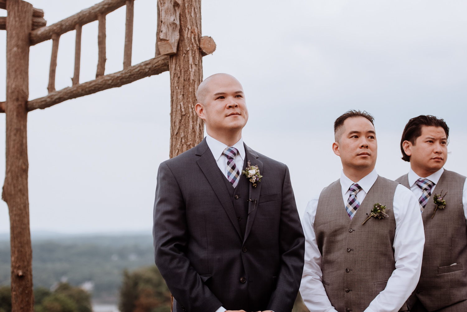 groom waits for bride at altar