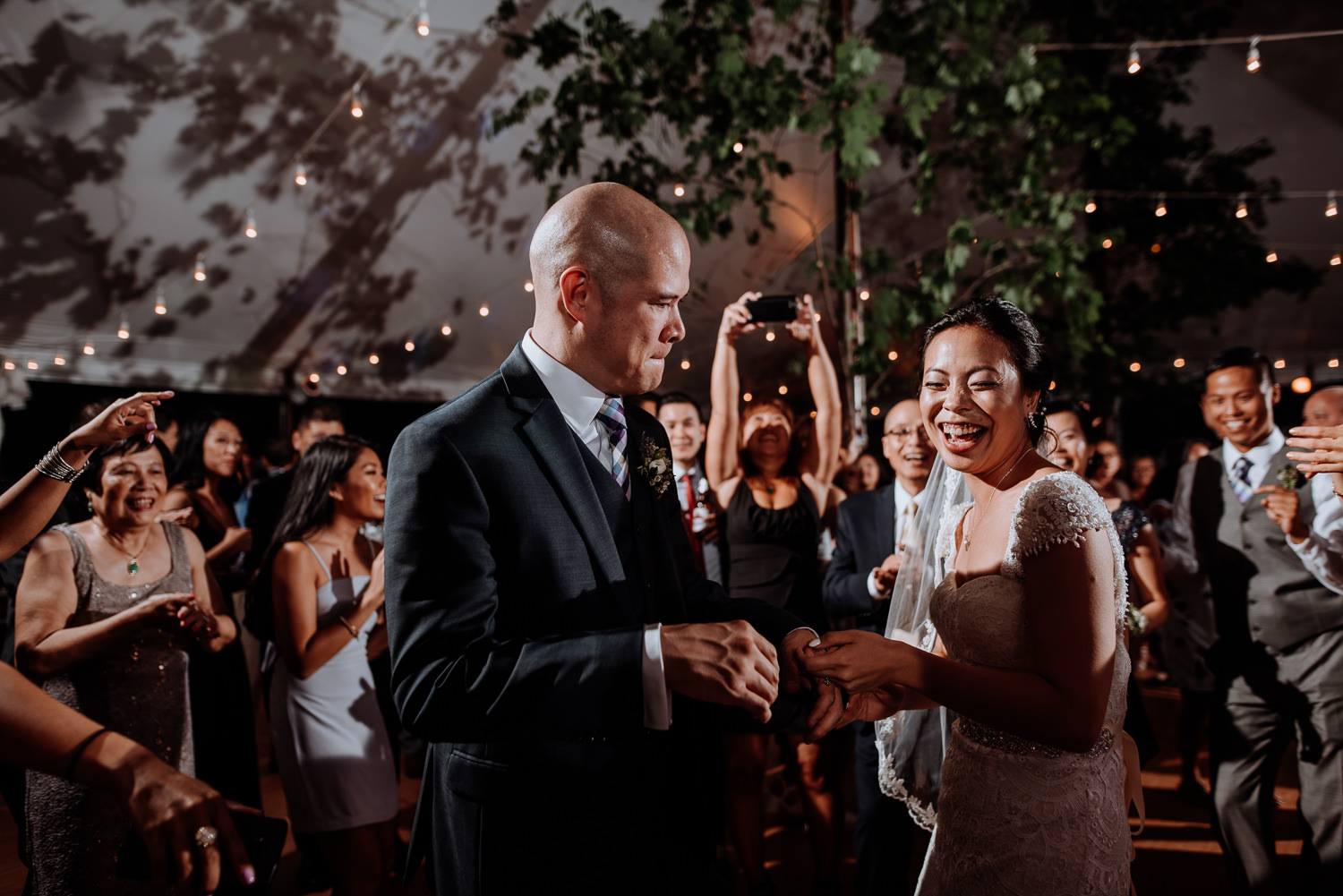 dancing couple at red maple wedding