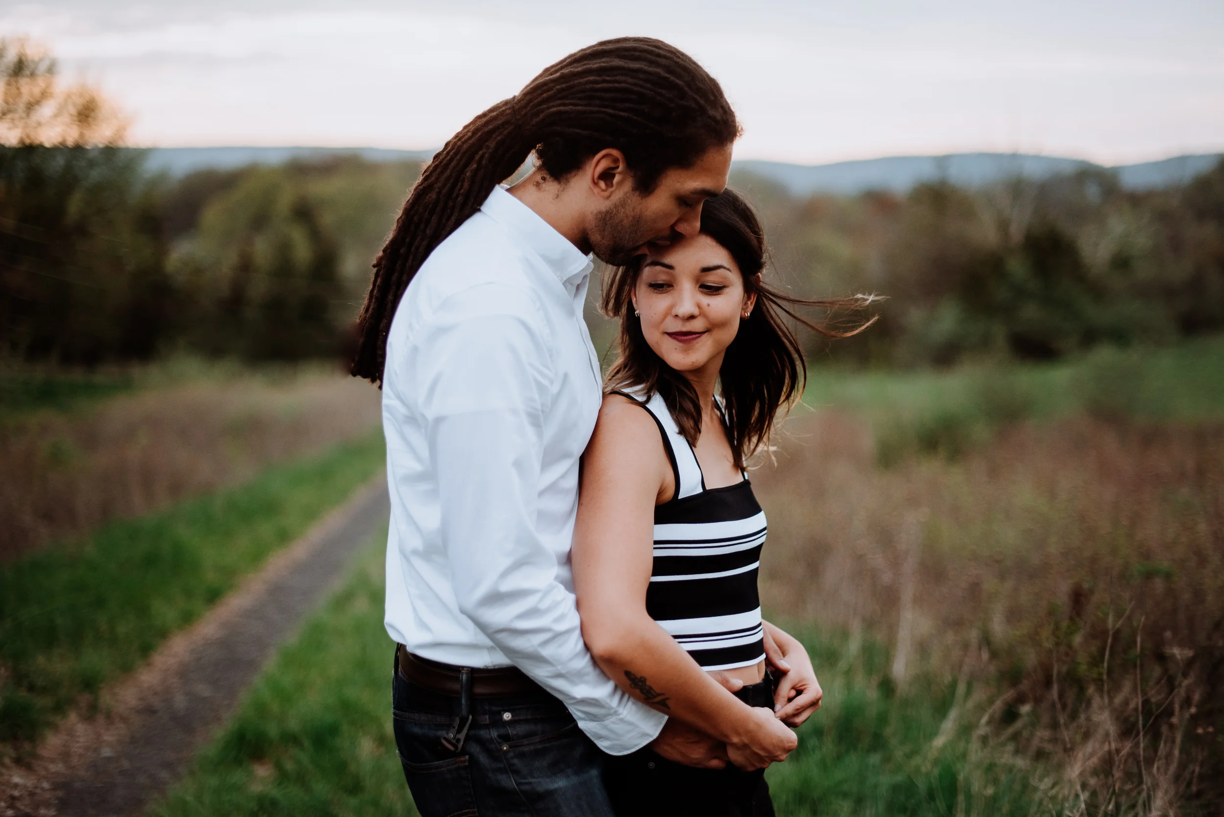 Hudson Valley Engagement session with apple blossoms, mountain v