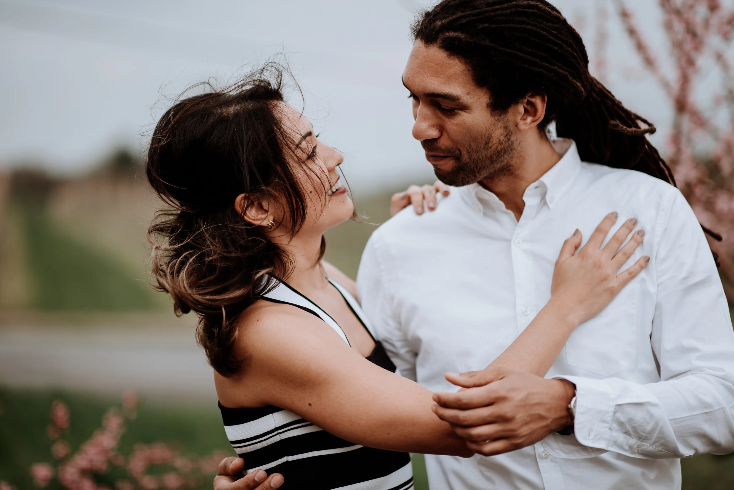 Hudson Valley Engagement session with apple blossoms, mountain v
