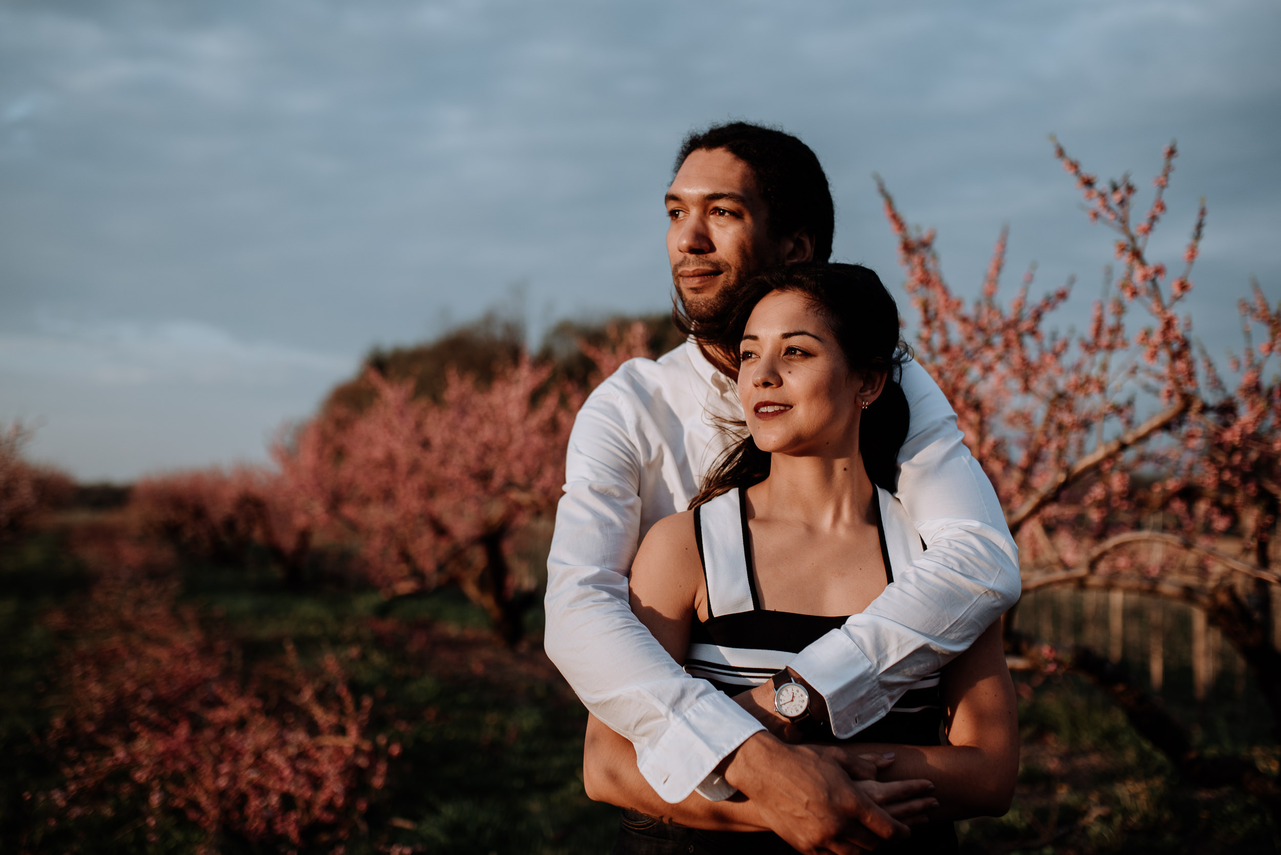 Hudson Valley Engagement session with apple blossoms, mountain v