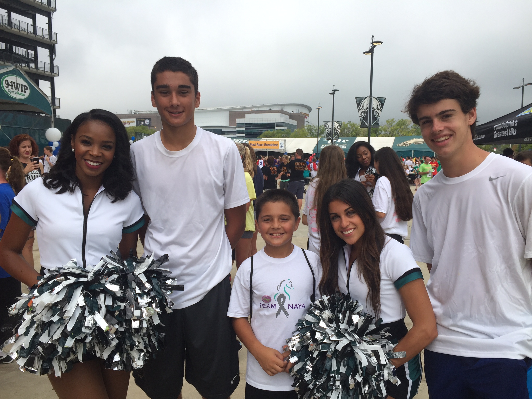 Boys with eagle cheerleaders.jpg