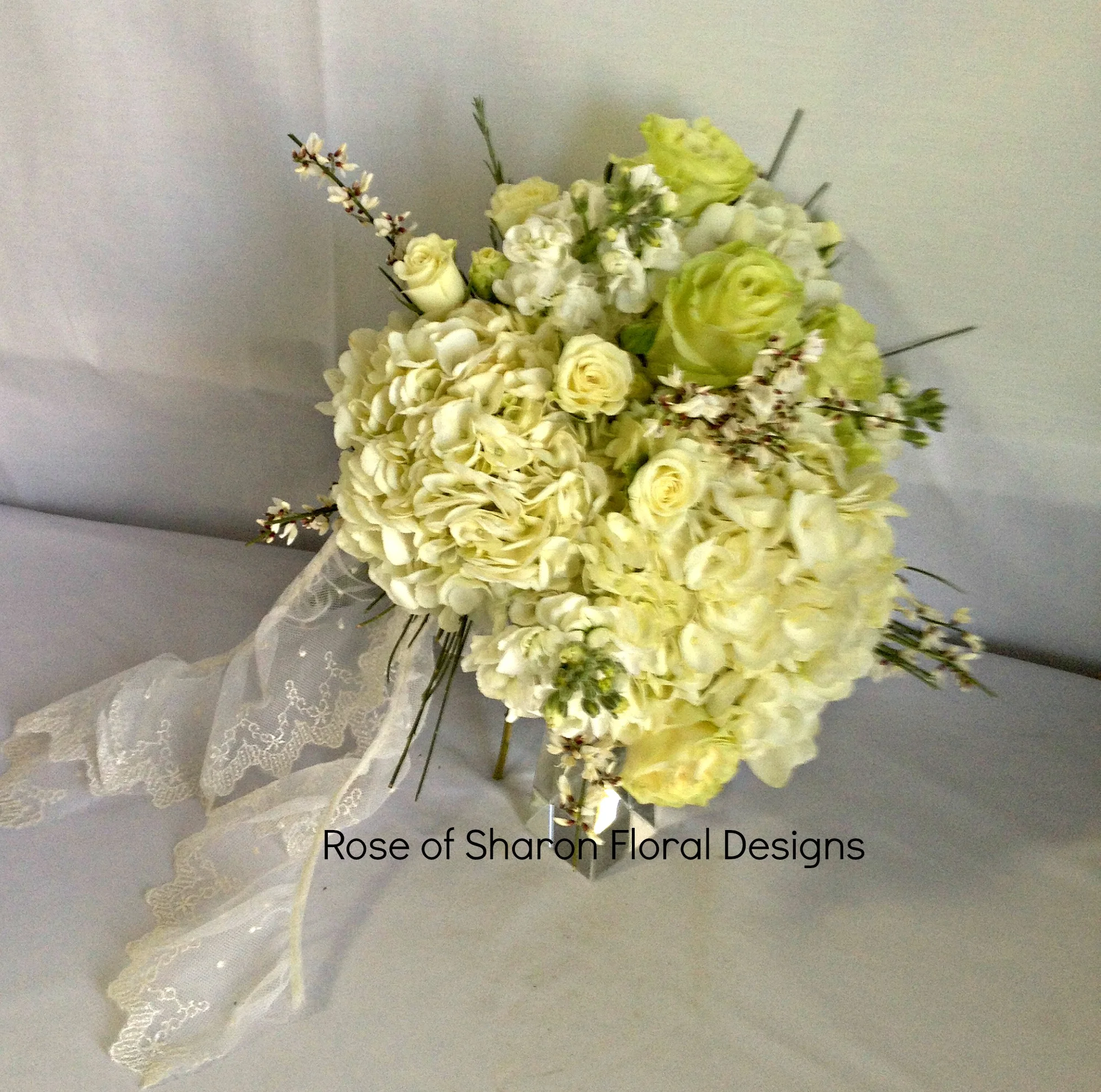 Hand-Tied Bouquet. White Hydrangeas, Roses & Stock. Rose of Sharon Floral Designs