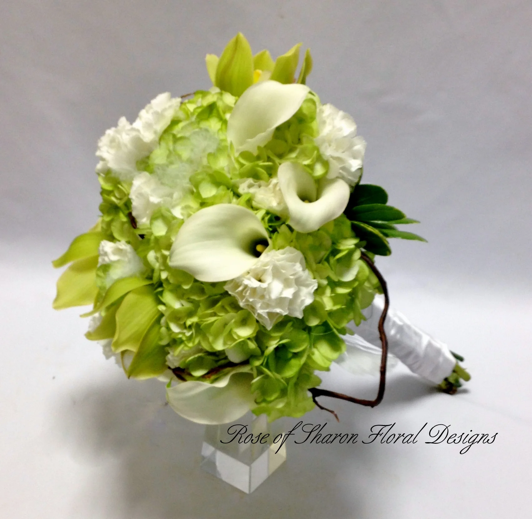 Hand-Tied Hydrangea, Calla Lily, Carnation Bouquet. Rose of Sharon Floral Designs