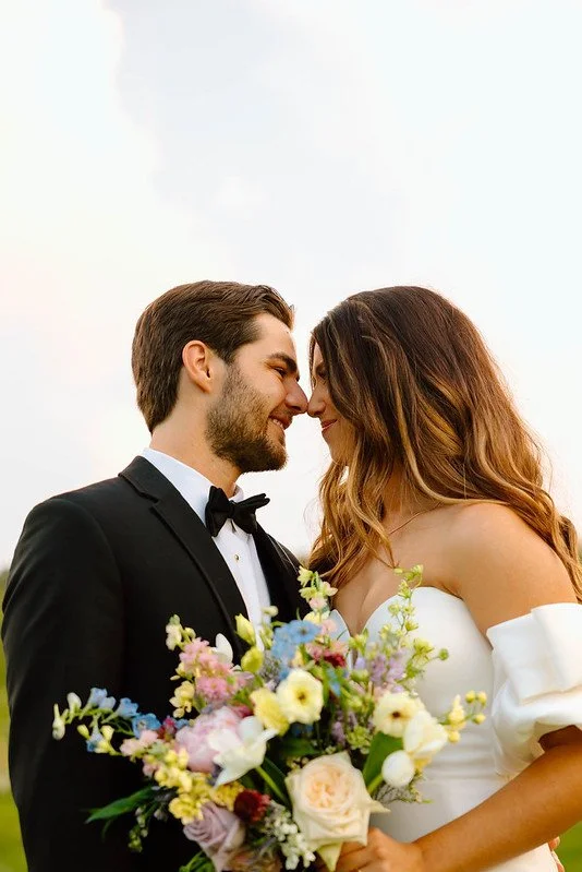 rose of sharon floral design studio wedding flowers sassafras springs vineyard fayetteville arkansas whimsical pastel colorful wedding bouquet photo by ana nunez