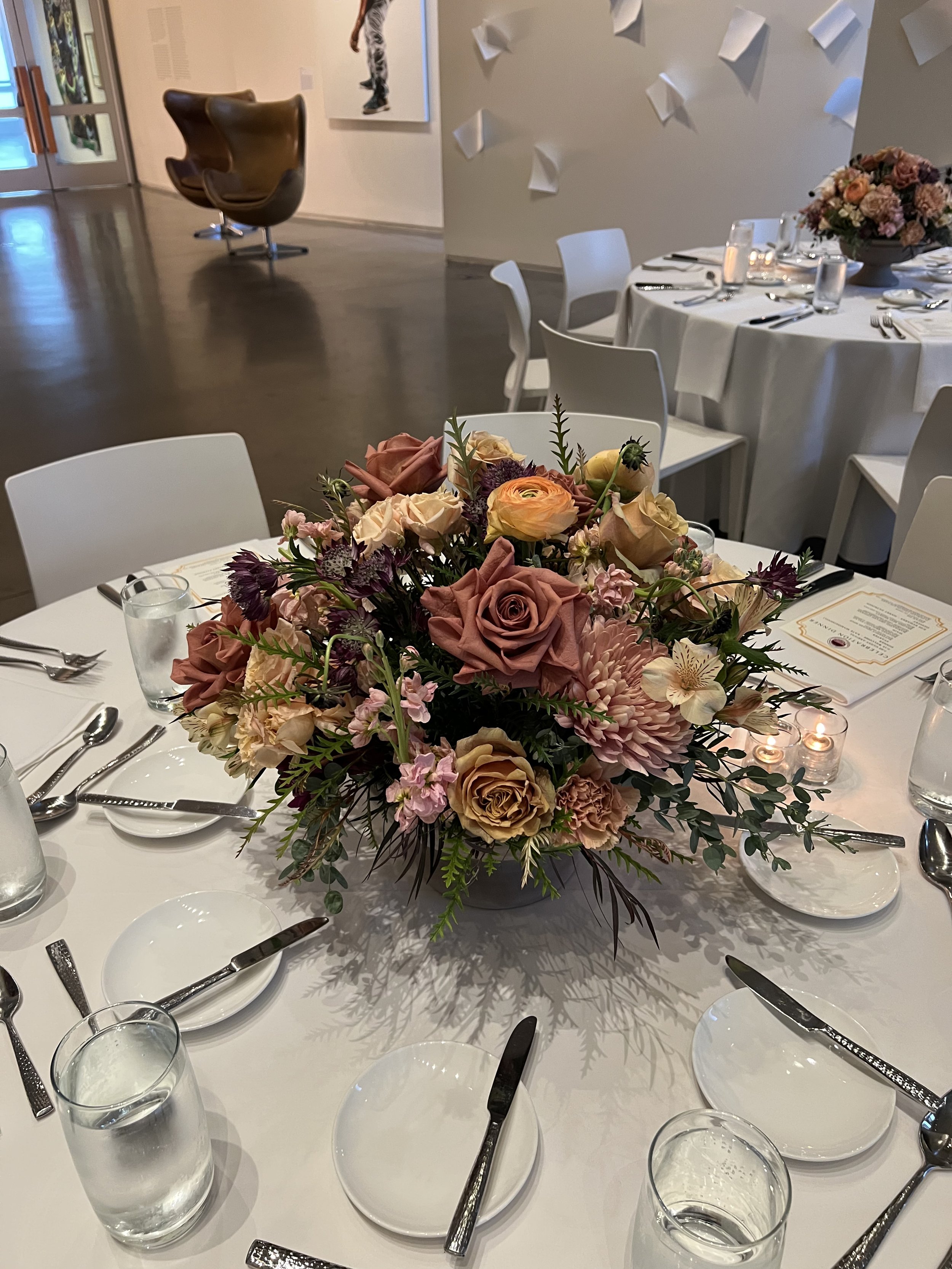 rose of sharon floral design studio corporate event flowers crystal bridges university of arkansas conference arrangements and centerpieces with peach and plum flowers compote lush full design at the hive 21c museum hotel bentonville