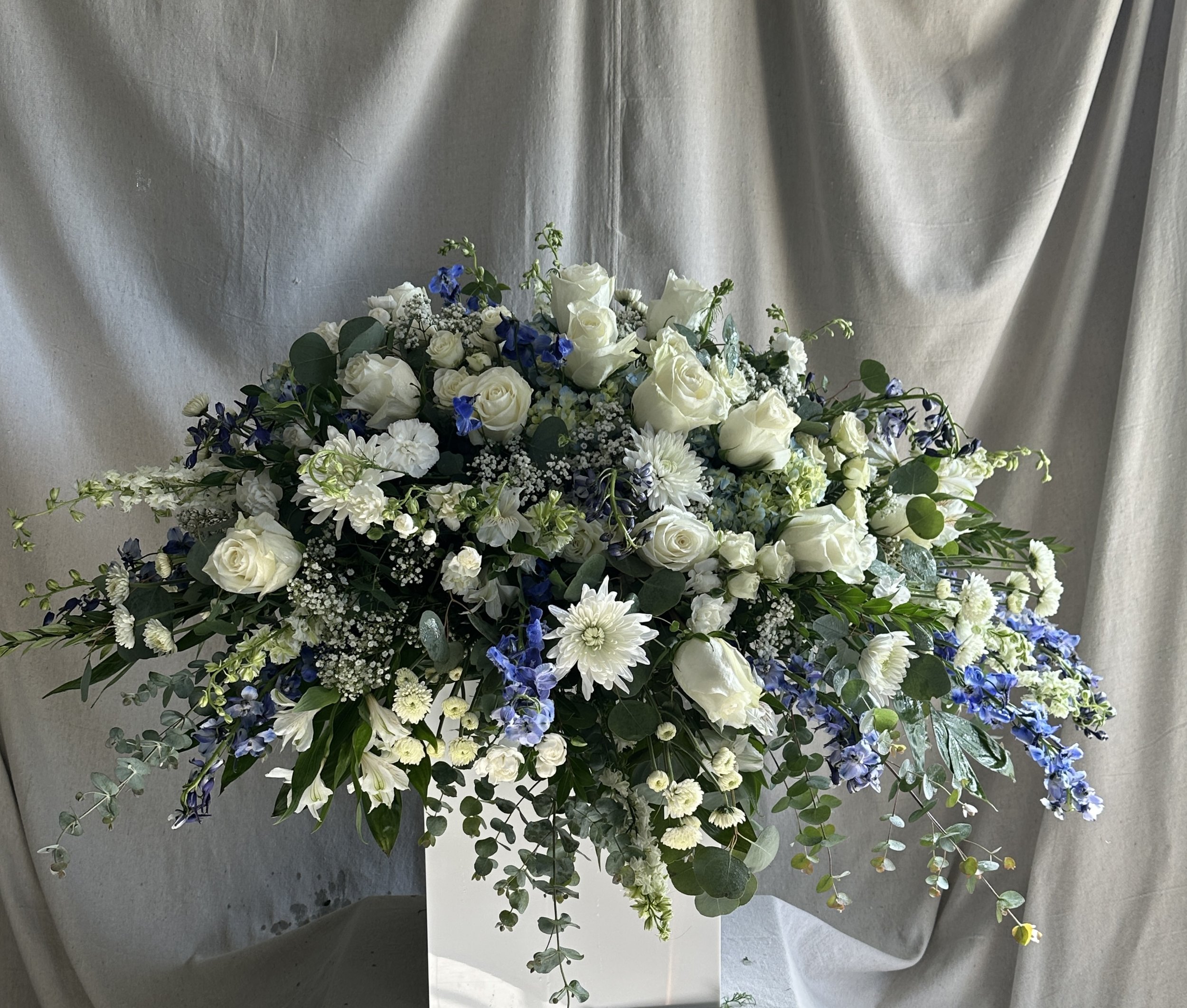 blue and white casket spray - Rose of Sharon.jpg