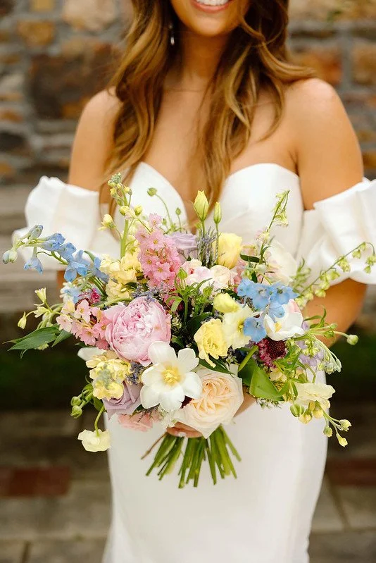 rose of sharon floral design studio wedding flowers sassafras springs vineyard fayetteville arkansas whimsical pastel colorful wedding bouquet photo by ana nunez