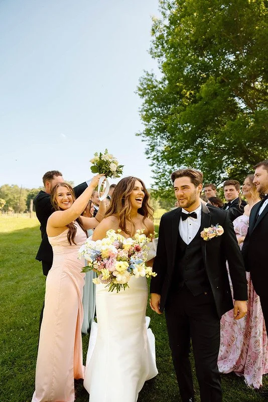 rose of sharon floral design studio wedding flowers sassafras springs vineyard fayetteville arkansas whimsical pastel colorful wedding bouquet photo by ana nunez