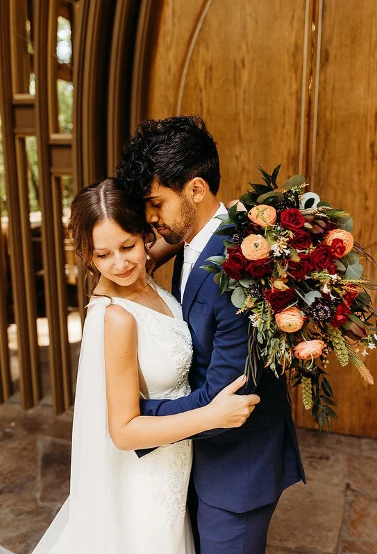 rose of sharon floral designs enchanting ozark mountain wedding burgundy cascade bouquet.jpg