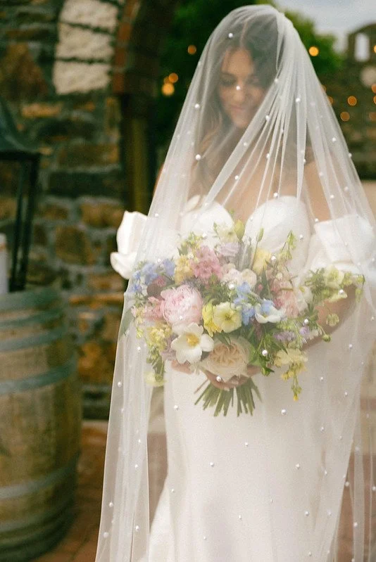 rose of sharon floral design studio wedding flowers sassafras springs vineyard fayetteville arkansas whimsical pastel colorful wedding bouquet photo by ana nunez