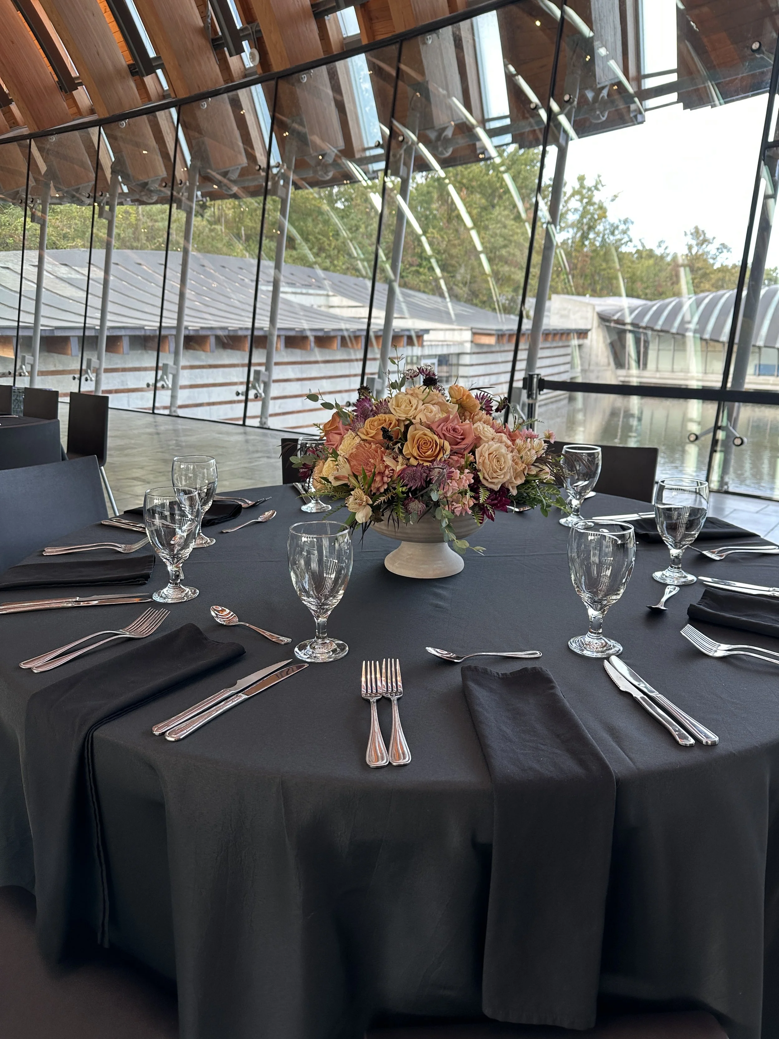 rose of sharon floral design studio corporate event flowers crystal bridges university of arkansas conference arrangements and centerpieces with peach and plum flowers compote