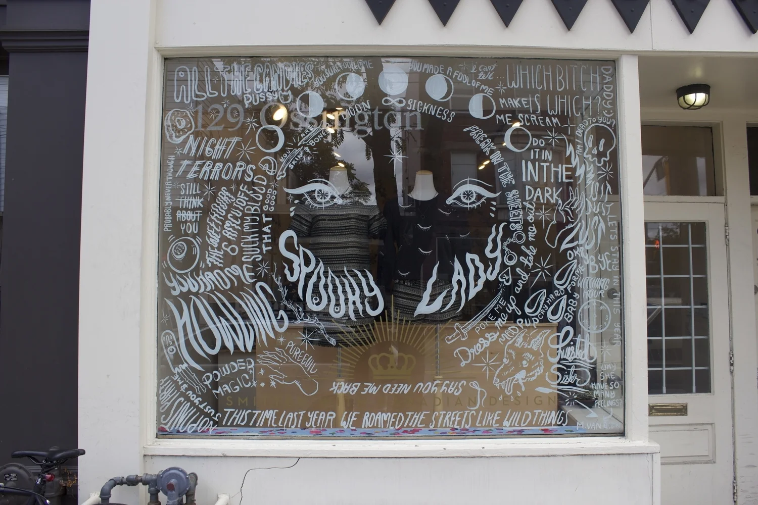 Halloween window at Victoire Boutique on Ossington
