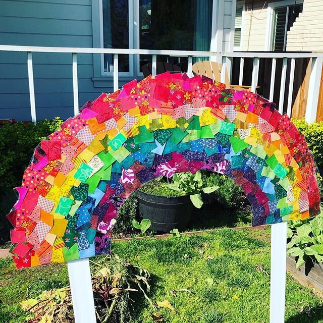 I used my big supply of paper scraps and collaged a rainbow for my yard (laminated with packing tape). It made me so happy to see a couple of rainbows on my morning walk, and I wanted to add to the joy!

Originally, it was in my window, but I moved i
