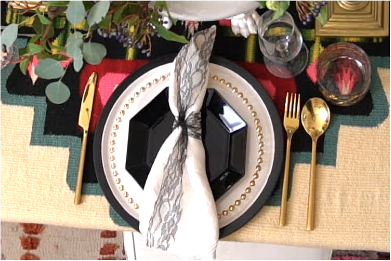 Before we get to the drama that square of lace is bringing as a stand in napkin ring, can we take a moment to notice that the place settings are a mix of 3 different plates from 3 different eras?