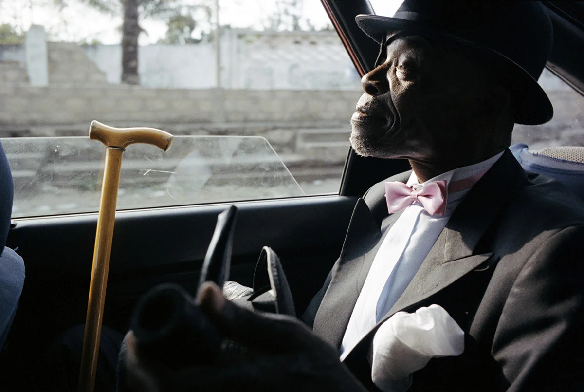 LE PARISIEN KIBOBA (the Old Parisian) in a taxi