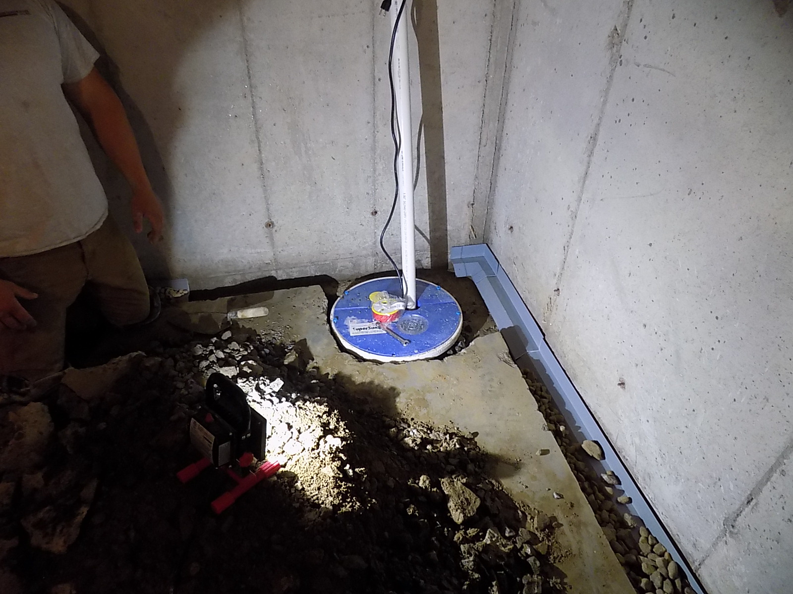 Sump pump laid in place