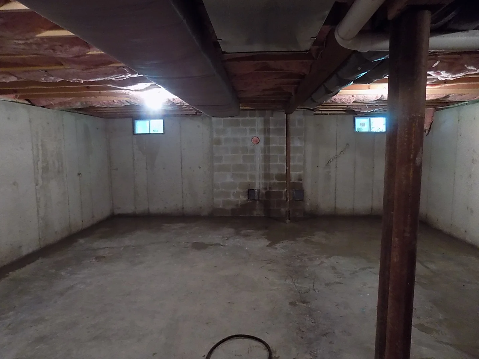 Basement is restored to it's regular condition, now waterproofed and safe from high rising water.