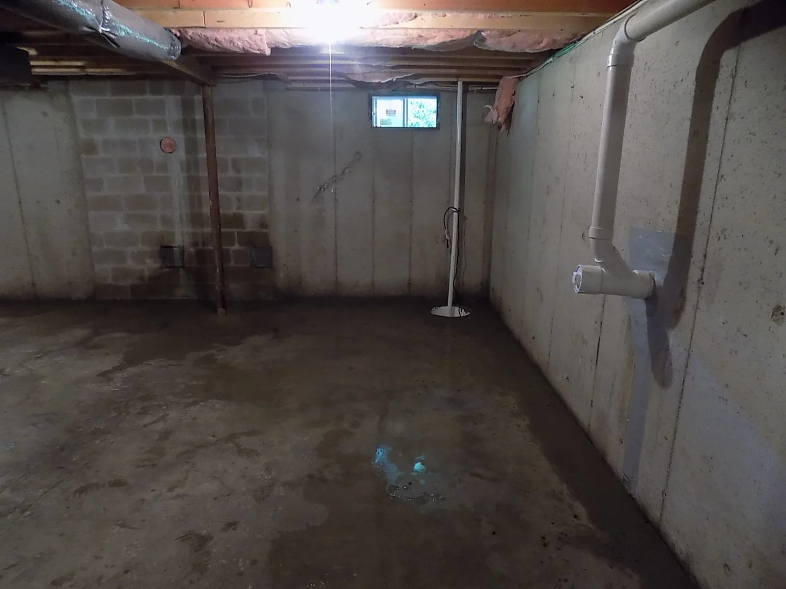 The sump pump and pipe are clean and efficient. If they ever sell this home, it will look well taken care of.