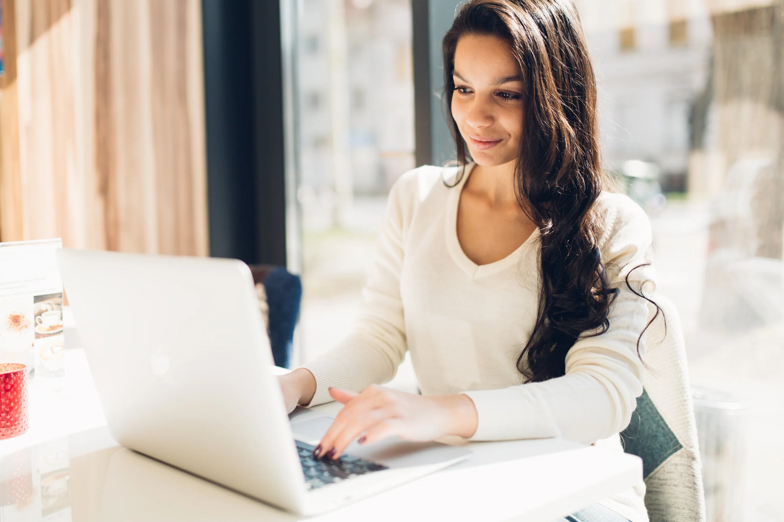 Young woman on computer.jpg
