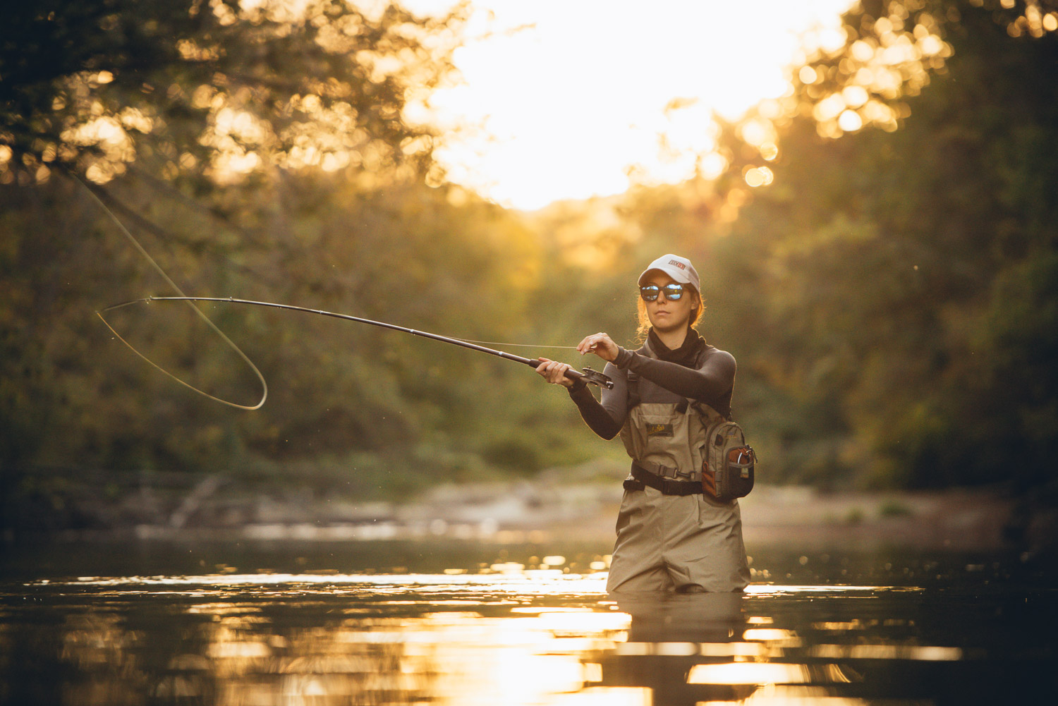 Woman fly-fishing in New Hampshire