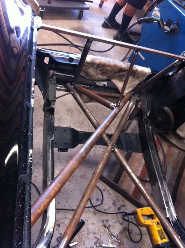 We decided to fabricate a new front clip, temporary bracing installed to hold important locations
