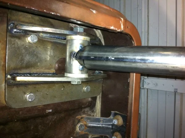 Front cage mounts through body