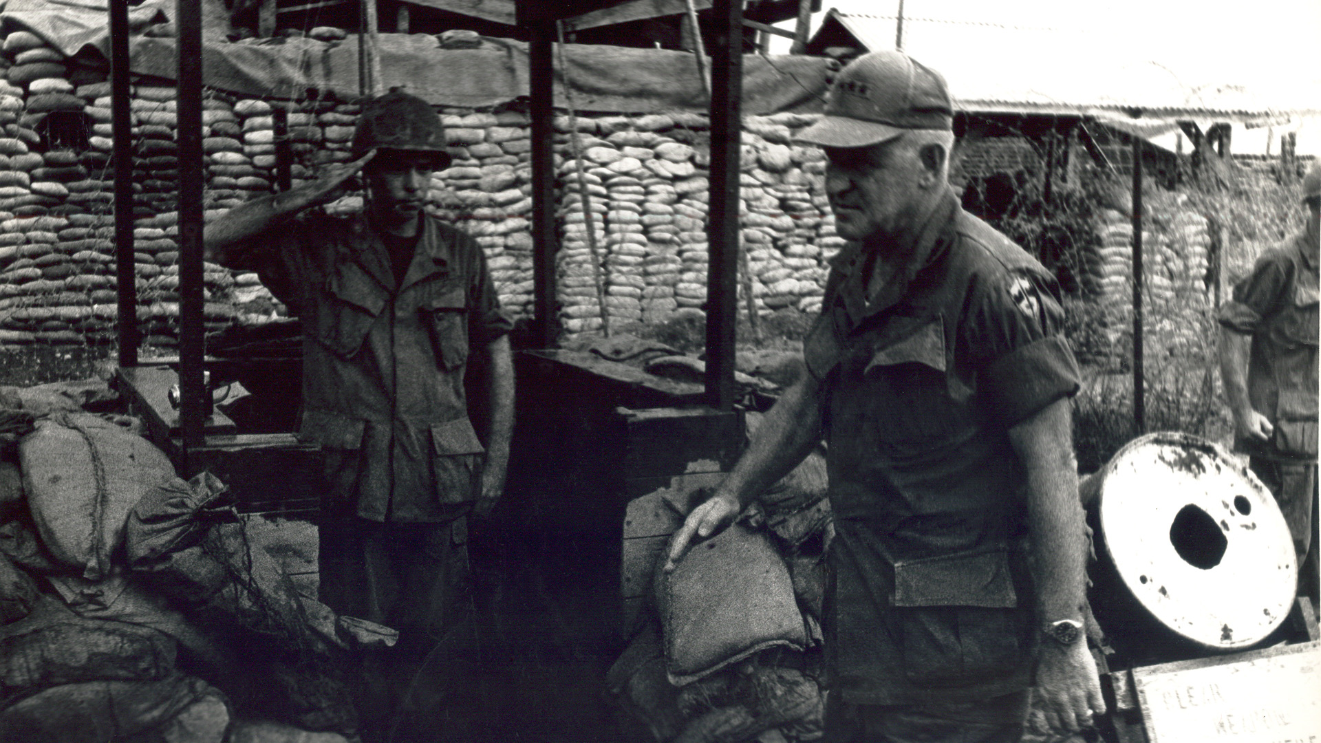 Sergeant Don Keller salutes General Abrahms during the siege of Dak To, 1969