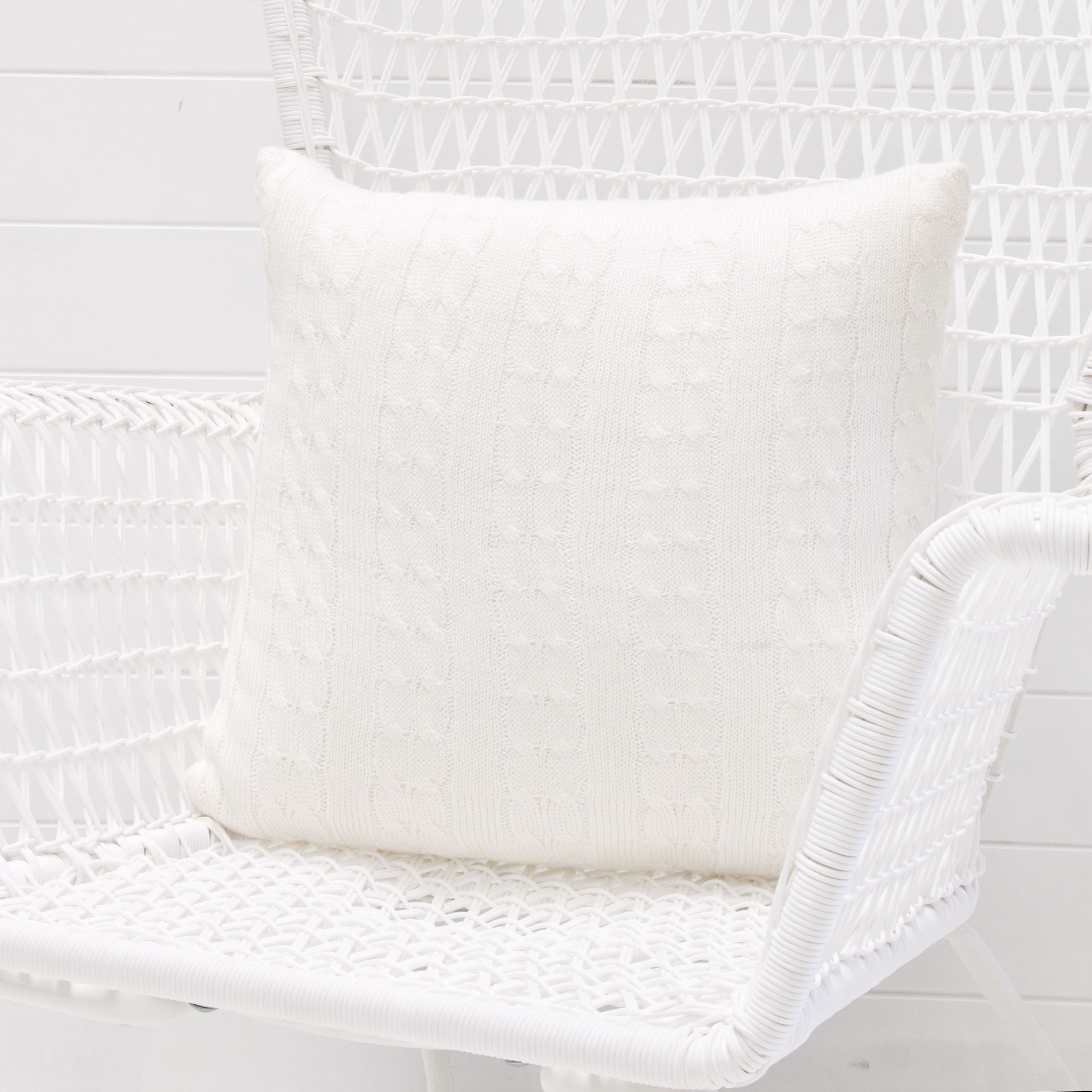 Knitted white cushion.jpg