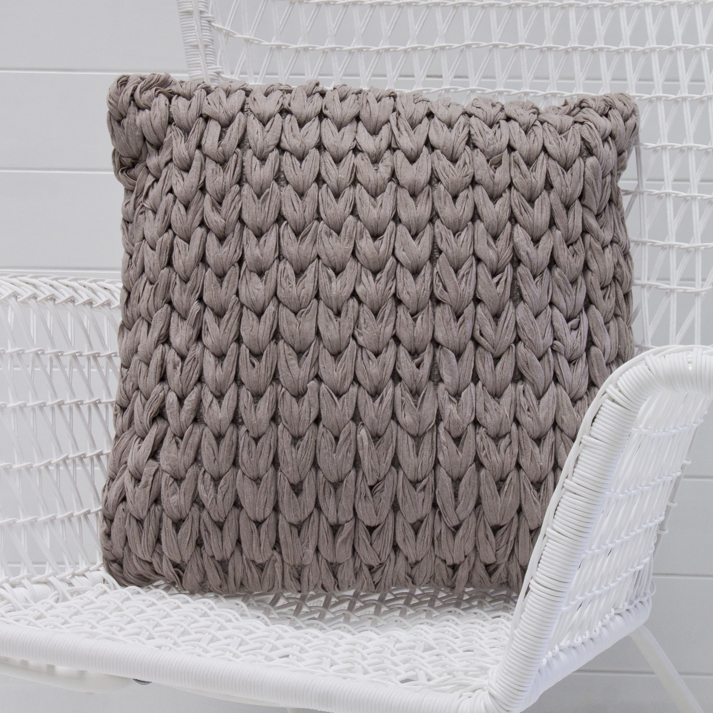 Taupe woolen cushion.jpg