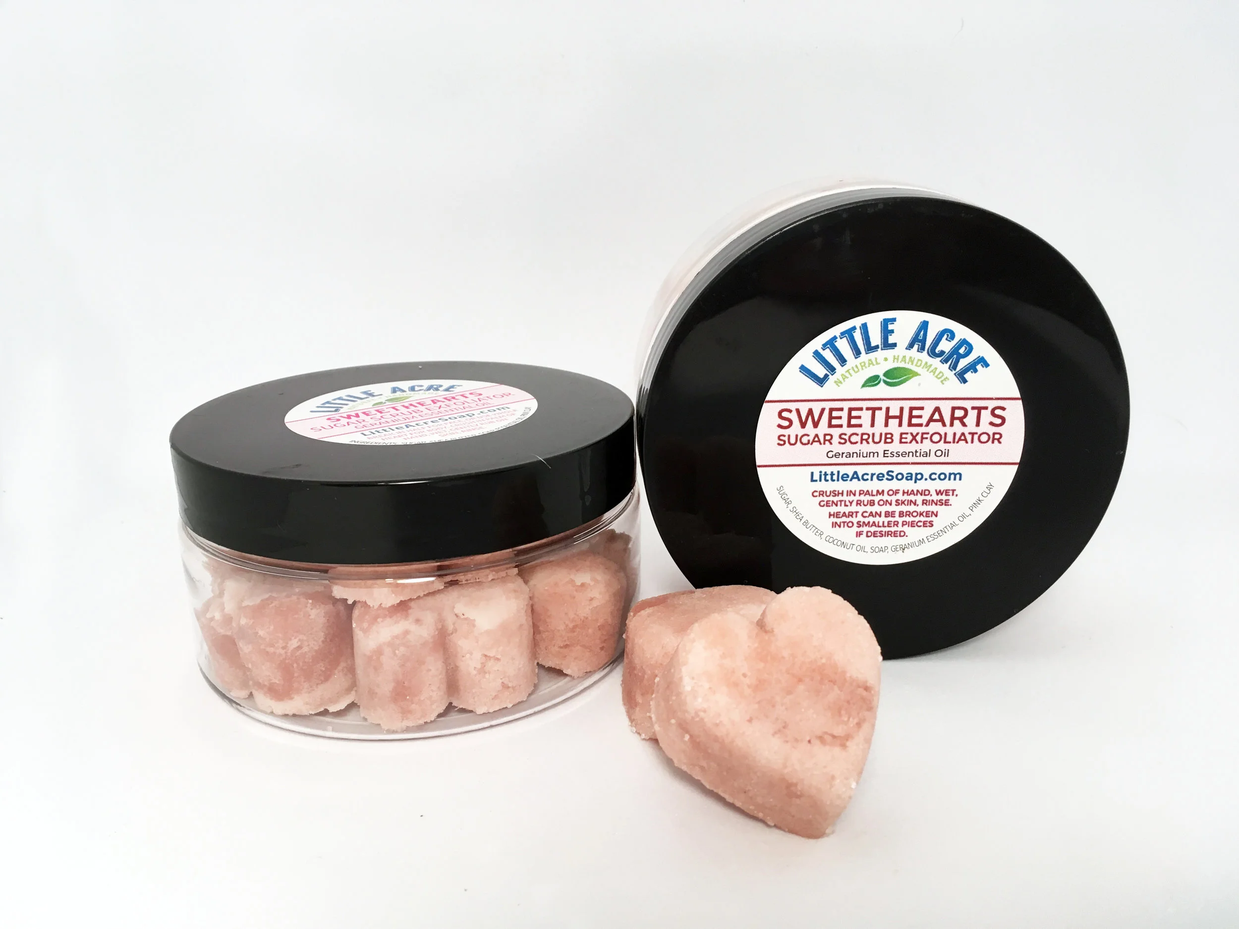 SWEETHEARTS SOLID SUGAR SCRUB Cute, heart-shaped scrubs scented with Geranium essential oil. Break off a corner to exfoliate face, or use the entire heart in the shower to exfoliate other body parts. Much more hygienic than a tub of traditional sugar scrub! There are 11 hearts in each jar. Made with Shea Butter for extra moisturizing benefits. Makes a great gift! $10