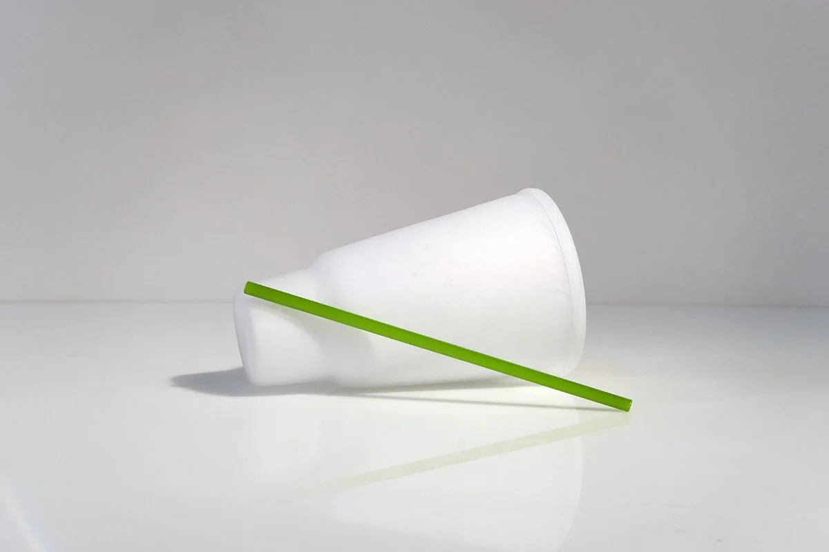 Green straw extending diagonally outward from foot of cup_03.jpg