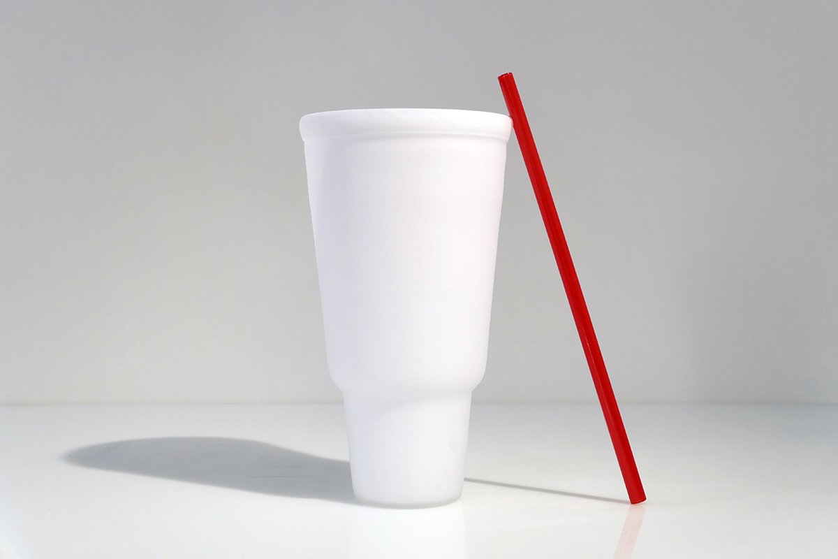 Red Straw Resting on Top Rim of Cup.jpg