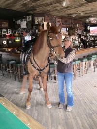 Cowgirl Kika and her horse Aragon in The RoundUp Saloon