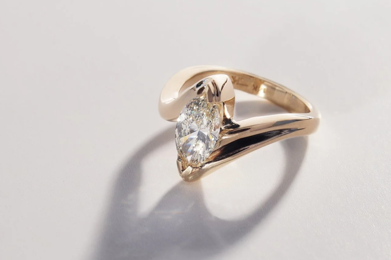 1.2ct natural marquise cut diamond in hand carved yellow gold