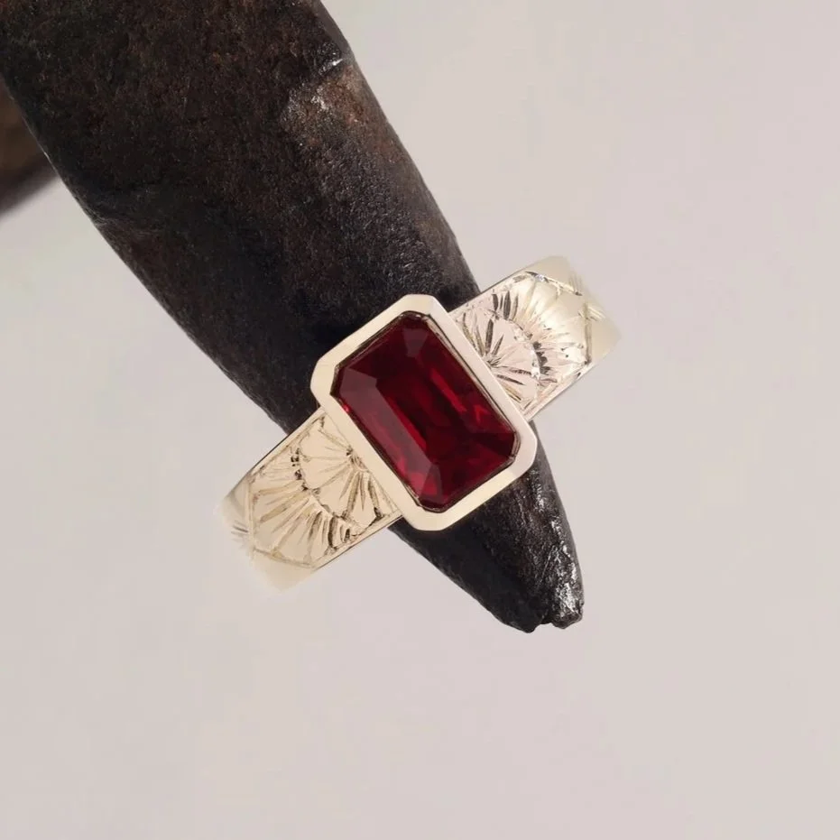 Pigeon's Blood ruby in custom made yellow gold ring